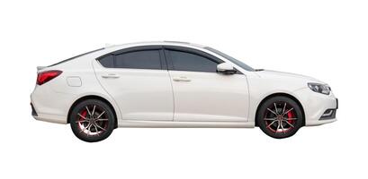 Side view of white sedan car isolated on white background with clipping path photo