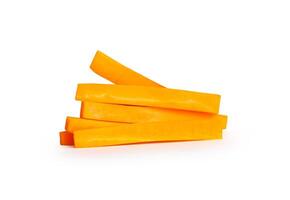 Side view of orange carrot slices in stick shape in stack isolated on white background with clipping path photo