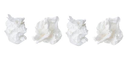 Top view set of crumpled or screwed tissue paper balls isolated on white background with clipping path photo