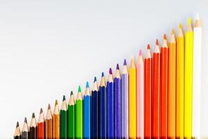 Color pencils on white background. Pencils for School or Professional Use. Drawing instruments for creating pictures photo