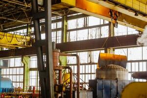 Modern factory. Work in production. Equipment, pipes at the power plant. A zone of increased danger. photo
