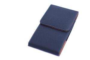 Black leather bag case for keeping smartphone on white background. Concept, accessory for containing mobile phone, waist belt vertical type. photo