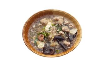 Clear vermicelli soup with minced pork, dried shrimp,mushroom, other ingredients in bowl, isolated on white background. Concept, Thai local cuisine food. Delicious menu with nutritious. Easy to cook. photo