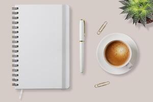 White notebook with spiral wire binding and elastic band, flat lay on table. Product mockup, design template photo