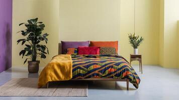 Stunning photograph of African black Ankara print patterns in yellow, purple, red, green, orange, and black photo