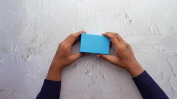 top view of person open a empty small gift box video