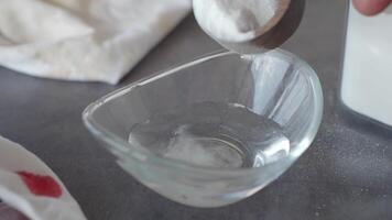 pouring Baking soda in a water video