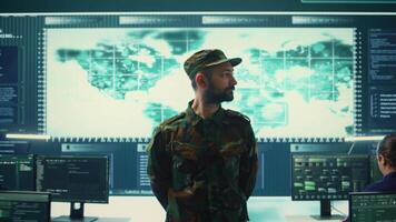 Government military hackers engaged in hybrid warfare strategies. Using sophisticated software and technology to secure information, prevent breaches and protect military operations. Camera B. video