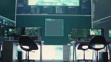Empty governmental cyber security room with computers and software displays. Emphasis on network security, cyber defense, and intelligence gathering to prevent cyber attacks and espionage. Camera B. video