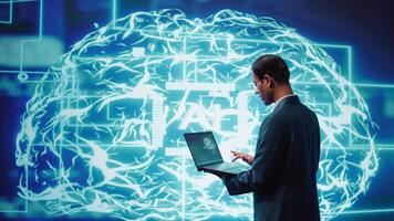 Computer scientist solving tasks on laptop, running artificial intelligence programming scripts. Engineer manipulating lines of code for AI applications development, camera B video