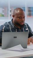 Vertical Clients discussing with the contractor next to green screen on tablet, meeting to review blueprints for a new office space. Business people looking to invest in real estate with realtor. Camera B. video