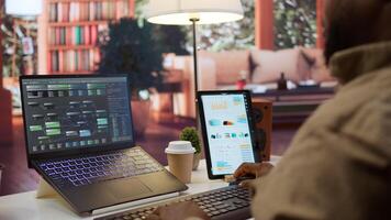 Professional software developer at desk working on AI coding and machine learning projects, showcasing innovation in software development and digital business. Internet of things. Camera B. photo