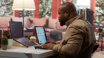 Professional IT engineer at his desk working on AI coding and deep learning projects, showcasing innovation in software development and cloud computing. Internet of things. Camera A. photo