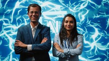 Portrait of smiling team of technicians implementing artificial intelligence parallel processing, breaking up complex computational tasks enabling AI systems to process data faster, camera A photo
