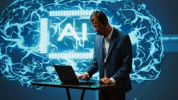 Engineer in artificial intelligence workplace managing call center tasks, speaking into headset. AI company worker chatting with customers through headphones mic, camera A photo