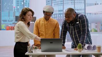 Realtor experts team meeting with entrepreneur to evaluate the office space layout, planning office relocation using architectural plans. Business woman shares her vision of the startup. Camera A. video