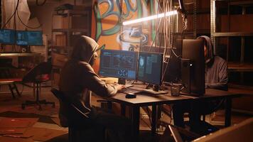 Hackers rushing to exit secret base after hearing police sirens, being wanted under custody for using bugs and exploits to break into computer systems and access valuable data photo