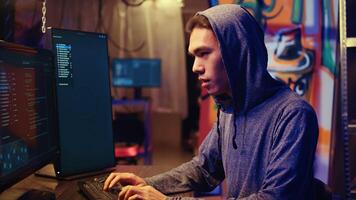 Hacker excited after finally developing zero day exploit undetectable by antivirus software installed on systems. Rogue programmer happy to successfully trick firewalls, close up photo