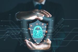 Businessmen protect personal data information from viruses on hand with virtual screen interfaces. Cyber security and privacy protection network security computer and safe data concept. photo
