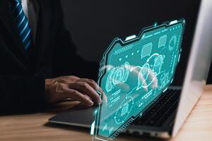 man use cloud computing system diagram show on hand.Data storage.Digital technology network service business in wireless storage concept. Implementing storage technology support in business. photo