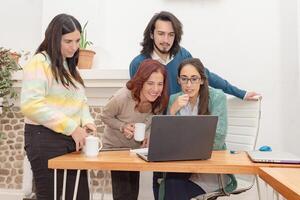 Team of diverse coworkers collaborating in the office. photo