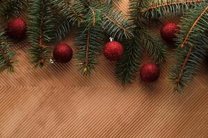 Abstract Christmas and New Year's background with Christmas tree and red Christmas balls. photo