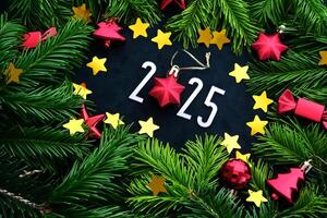 New Year 2025 background. Number of the coming year in Christmas decoration. photo