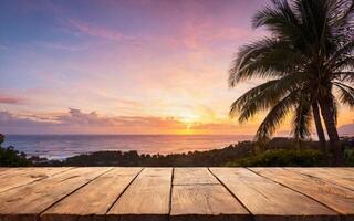 wooden empty table at sunset with ocean and palm trees view photo