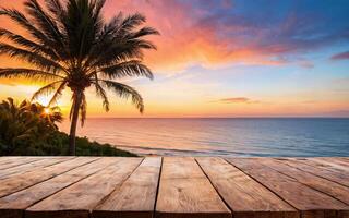 wooden empty table at sunset with palm trees and beach view photo