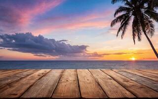 wooden empty table at sunset with ocean view photo