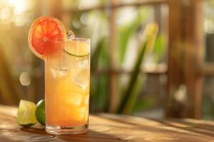 A vintagestyle image showcases a grapefruit cocktail with lime garnish in a retro tropical setting under sunlight, evoking a cozy and delicious atmosphere perfect for relaxation and enjoyment photo