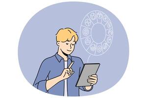 Man reading horoscope on tablet vector