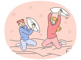 Smiling girls engaged in pillow fight at home vector