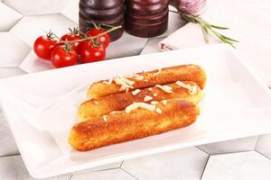 Fried cheese sticks for snack photo