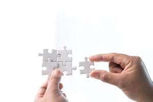 Developing strategic approach to each challenge in business is like piecing together jigsaw puzzle, solution fits into place with careful planning and steady hand, ultimately leading to success. photo