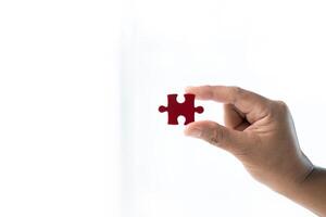 Developing strategic approach to each challenge in business is like piecing together jigsaw puzzle, solution fits into place with careful planning and steady hand, ultimately leading to success. photo