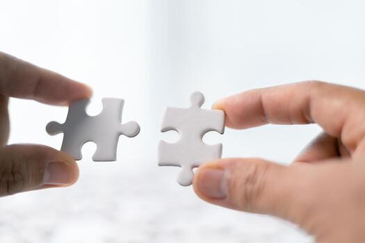 Team with piece of jigsaw puzzle as critical component of business strategy, understanding teamwork and collaboration were essential for achieving success and realizing concept of well-executed plan. photo