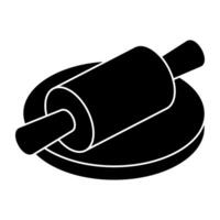 A colored design icon of rolling pin and board vector