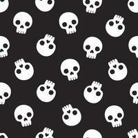 Simple seamless pattern with human skulls on a black background. graphics. vector