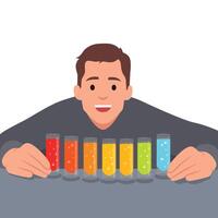 Young concentrated scientist looking at test tubes with multi colored liquid. vector