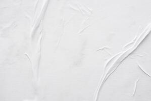 Textured White Paper Poster Background with Crumpled and Creased Surface photo