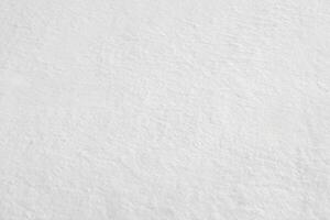 Textured Snow Blanket on Flat Terrain, Uniform Winter Landscape photo