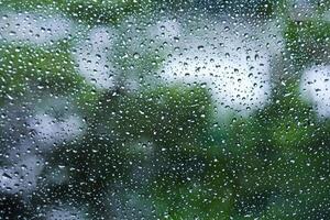Macro Shot of Raindrop on Frosted Glass Window photo