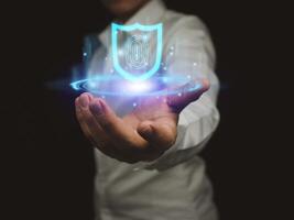 secure internet access cyber security man showing protection technology lock screen key Preventing attacks from malicious people on the Internet photo