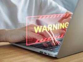 computer hack warning Malicious software. Virus. Businessman showing attack sign. cyber on computer network Accessing malicious websites photo