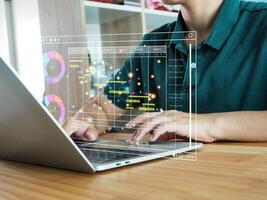 Business Analysis. Businessman using KPI business analysis with golden graph photo