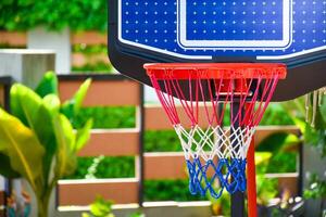 Close up colorful basketball hoop for basketball games in playground on nature background. photo