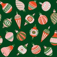 Vintage Christmas tree ornaments in red and pink on green background seamless pattern. Repeat holiday season pattern for wrapping paper, textile design. vector