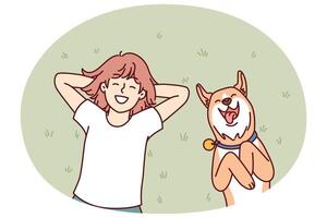 Little girl and dog lie on grass in backyard of house and enjoy sunny summer day vector