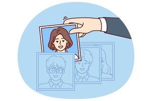 Hand of recruiter making selection of employees for company assembling team in HR division vector